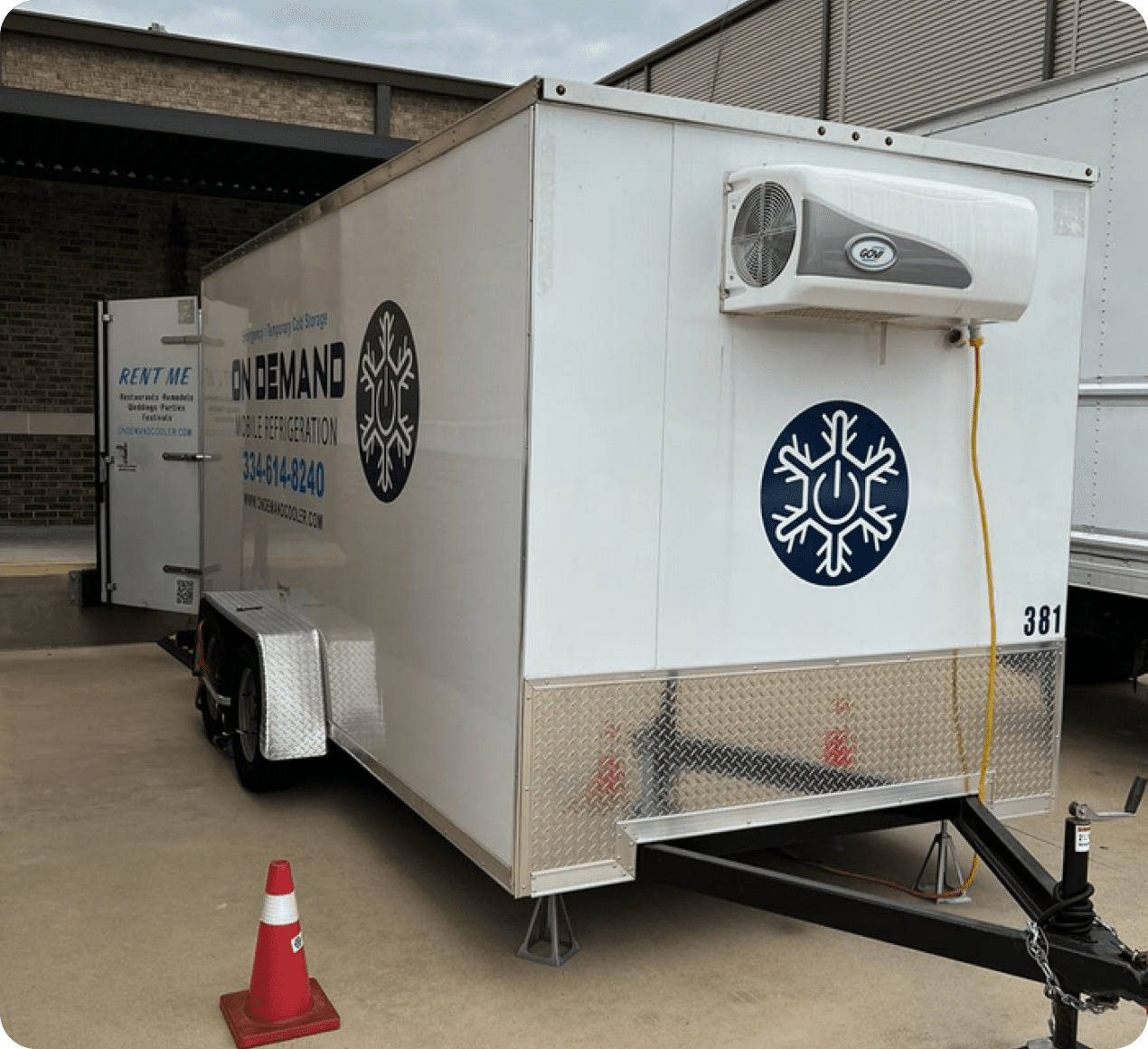 White refrigerated trailer with cooling unit