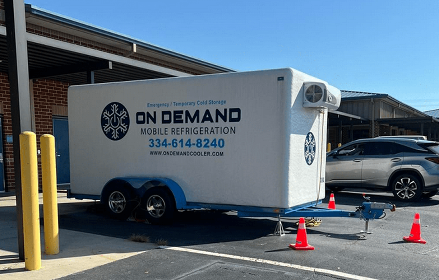 Mobile refrigeration trailer in parking lot